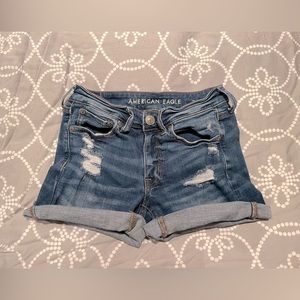 blue ripped jean shorts